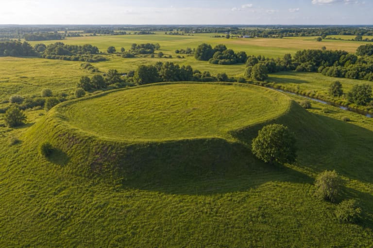 Green platform and high rampart of Apuolė Hillfort in the fields of the Skuodas region