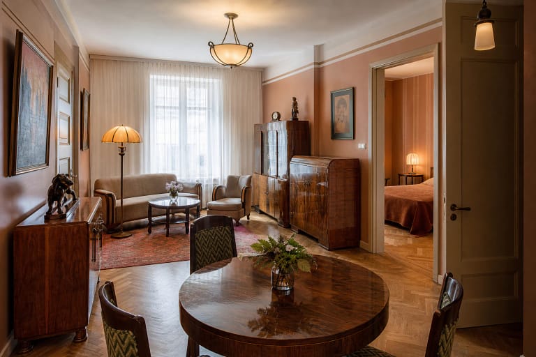 Interwar apartment interior of the Art Deco Museum in Kaunas at Gedimino g. 48 with geometric furniture and warm lighting