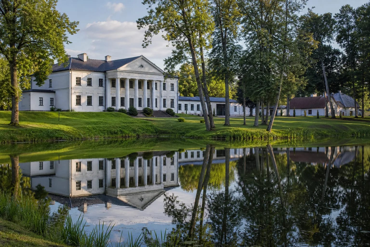 Classicist Aštrioji Kirsna Manor house with portico and park in Lazdijai District