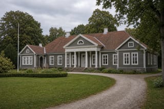 Single-storey wooden palace of Biržuvėnai Manor Estate in a green Samogitian setting by the Virvytė