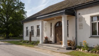 Old building of Dovilai Ethnic Culture Centre with the atmosphere of ethnocultural events