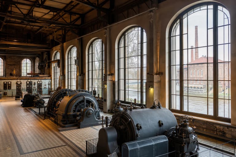 Former power-plant hall of the Energy and Technology Museum in Vilnius with turbines and industrial details