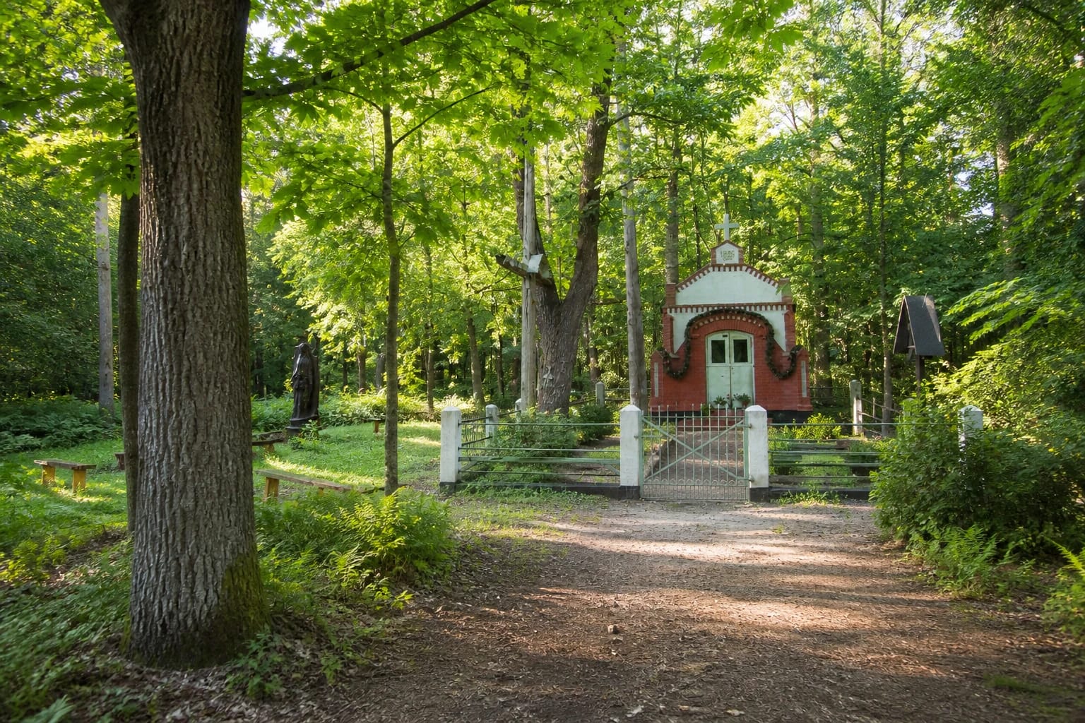 Erškėtynas red-brick chapel in a forest clearing beside its spring