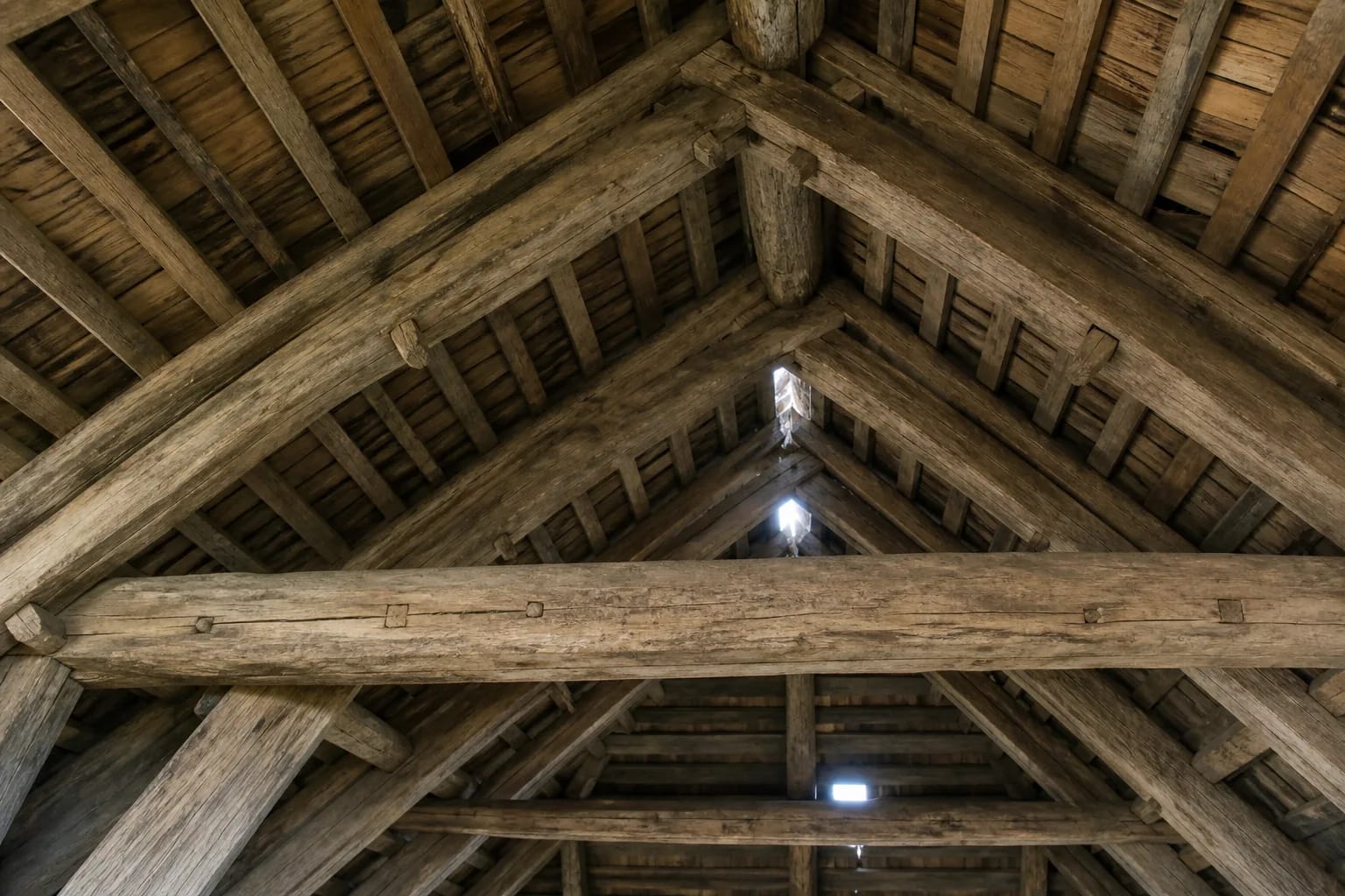 Rafter construction carried the roof with paired rafters.