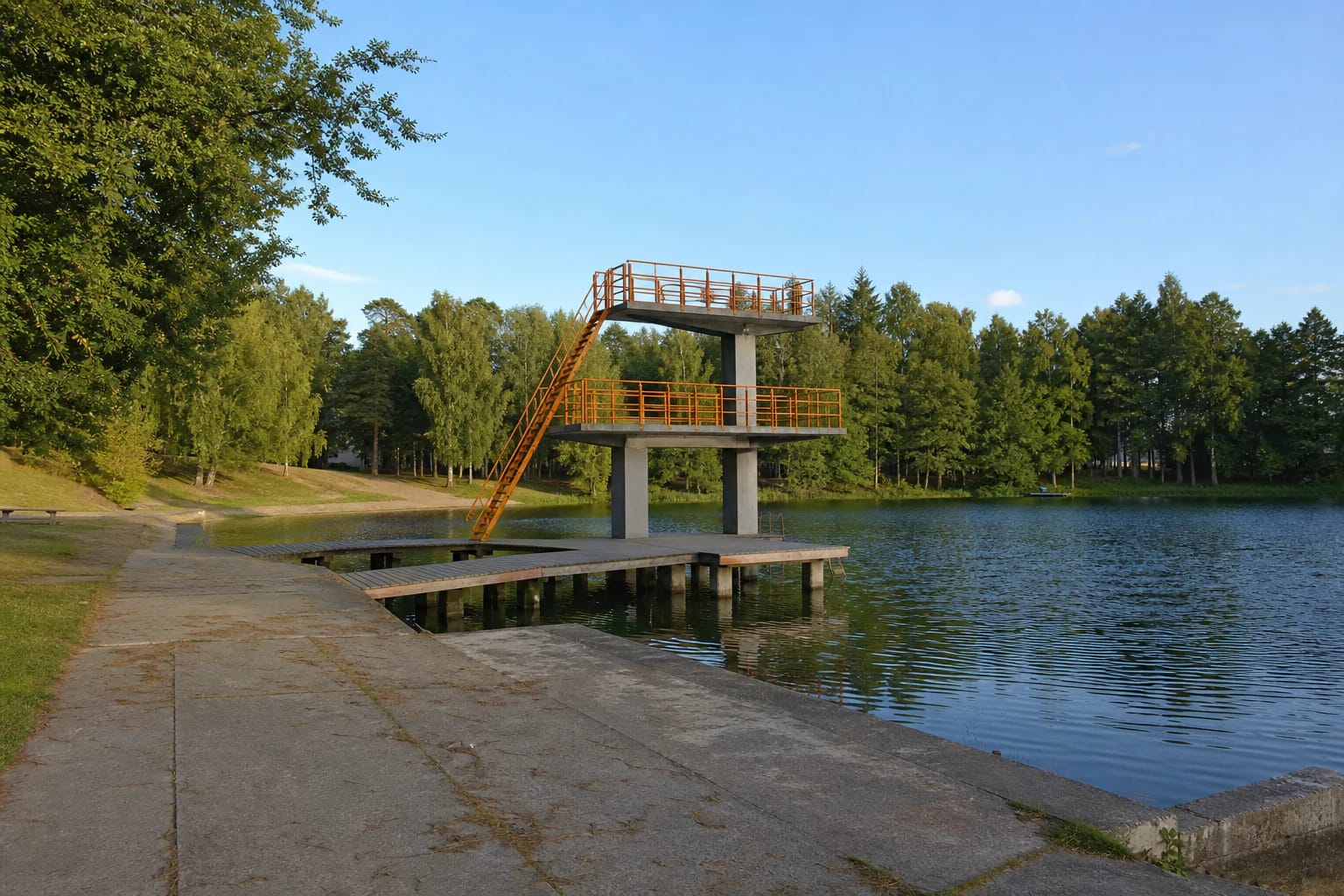 Girelė II Pond Beach bridge and orange-railed diving platform over the pond