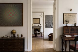 Room of the Kazys Varnelis House-Museum with optical art paintings and collection objects