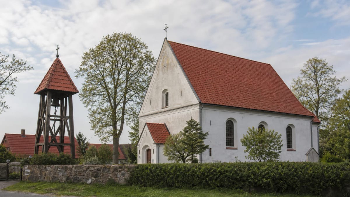 Kintai Evangelical Lutheran Church with a red-tile roof and separate belfry