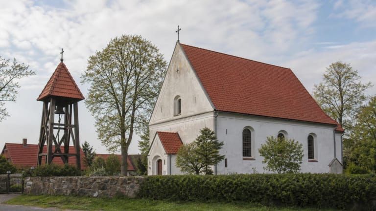 Kintai Evangelical Lutheran Church with a red-tile roof and separate belfry