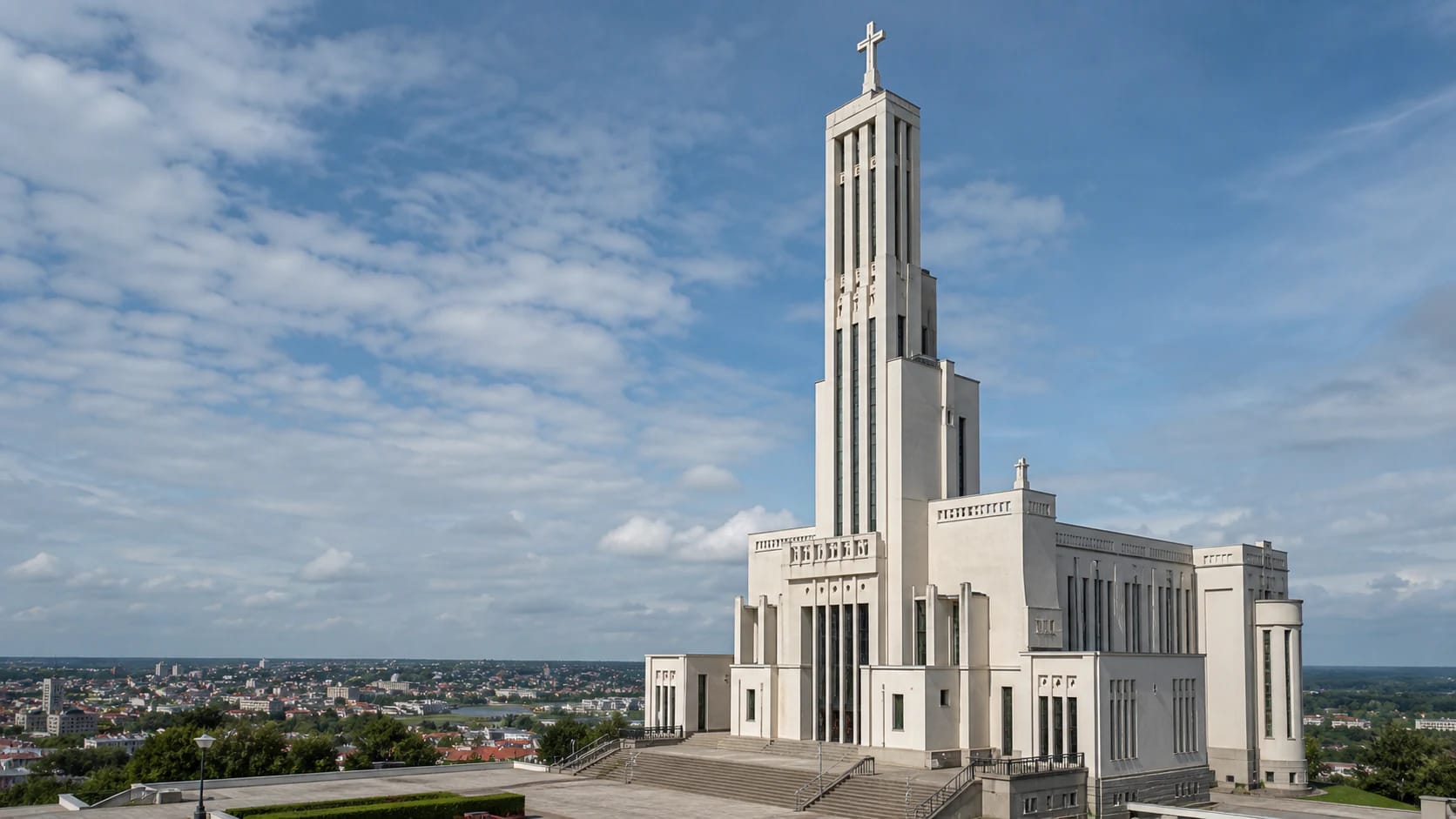 Christ's Resurrection Basilica in Kaunas Žaliakalnis with a tall Modernist tower and city panorama