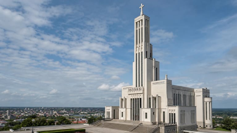 Christ's Resurrection Basilica in Kaunas Žaliakalnis with a tall Modernist tower and city panorama