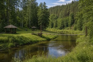 A bend of the Akmena River and the recreation area at Lakštingalų slėnis in Pagramantis Regional Park