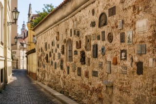 Literatų Street wall in Vilnius Old Town with small art dedications to writers and poets