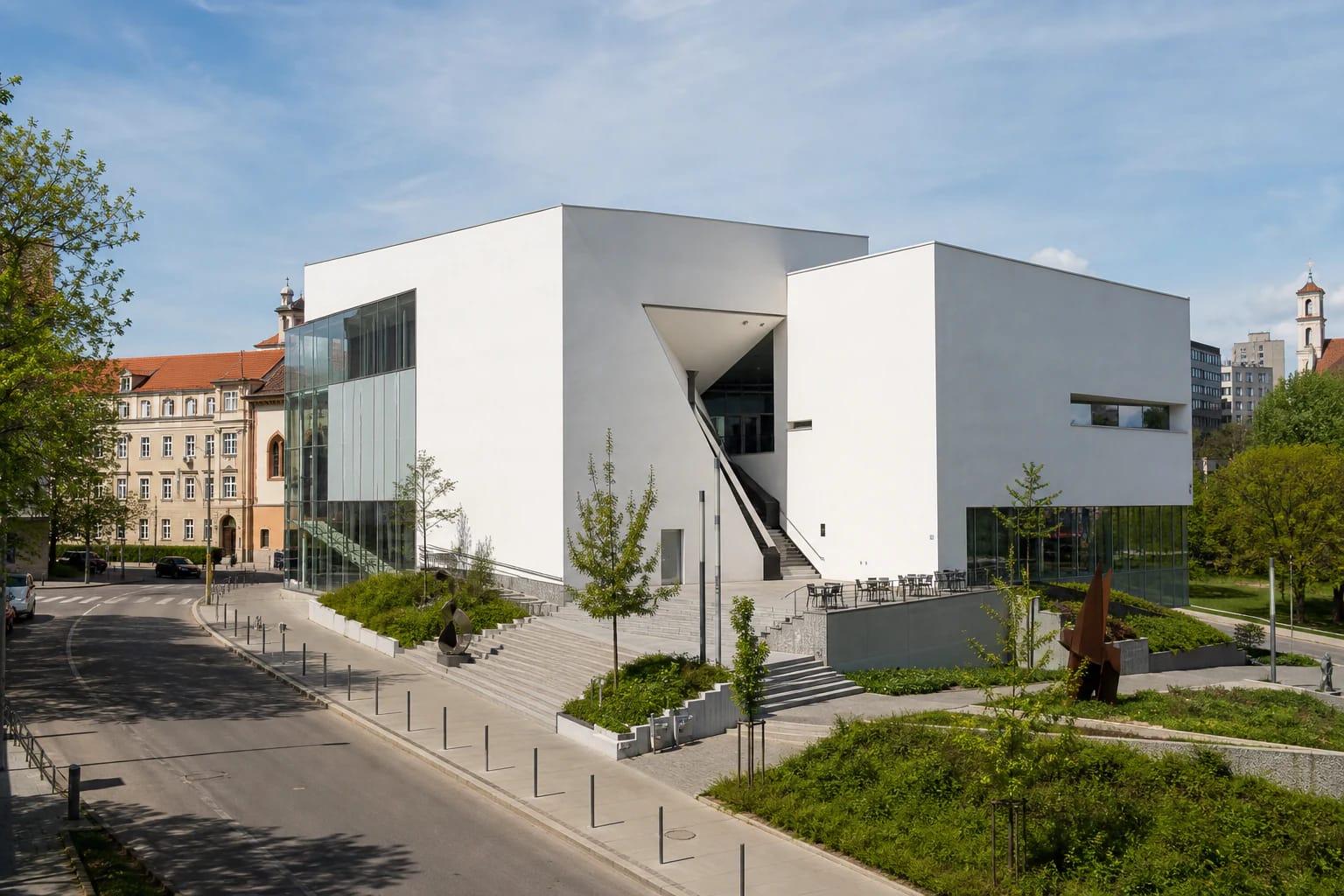 White modern MO Museum building on Pylimo Street with an angular entrance and open terrace