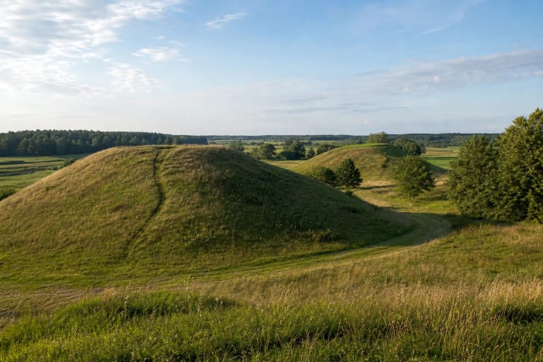 Grassy hills of Molavėnai Hillforts in a Raseiniai District valley landscape