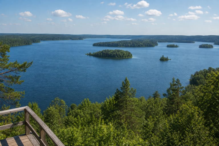 Lake Plateliai with wooded islands, blue water, and the shores of Žemaitija National Park