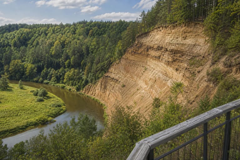 Layered cliff of Pūčkoriai Outcrop and the Vilnia River valley