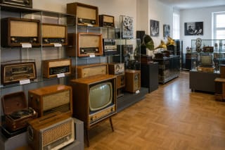 Old radio receivers and television sets displayed in the Radio and Television Museum in Šiauliai