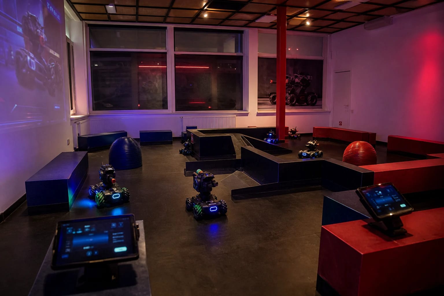 Combat robots and control tablets on the Robo Arena Vilnius course