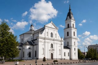 White facade and high tower of Šiauliai Cathedral of Sts Peter and Paul in the city centre
