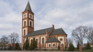 Šilutė Evangelical Lutheran Church with a high tower and the surrounding Pamarys townscape