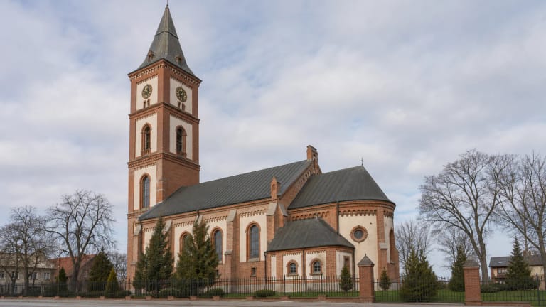 Šilutė Evangelical Lutheran Church with a high tower and the surrounding Pamarys townscape
