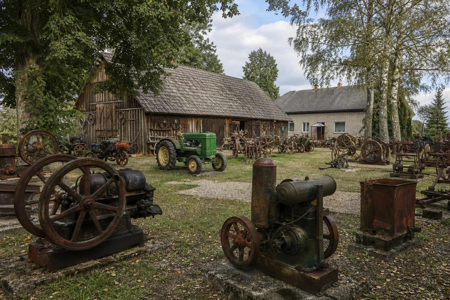 Tractors and engines at Smalininkai Museum of Ancient Technology in Jurbarkas District
