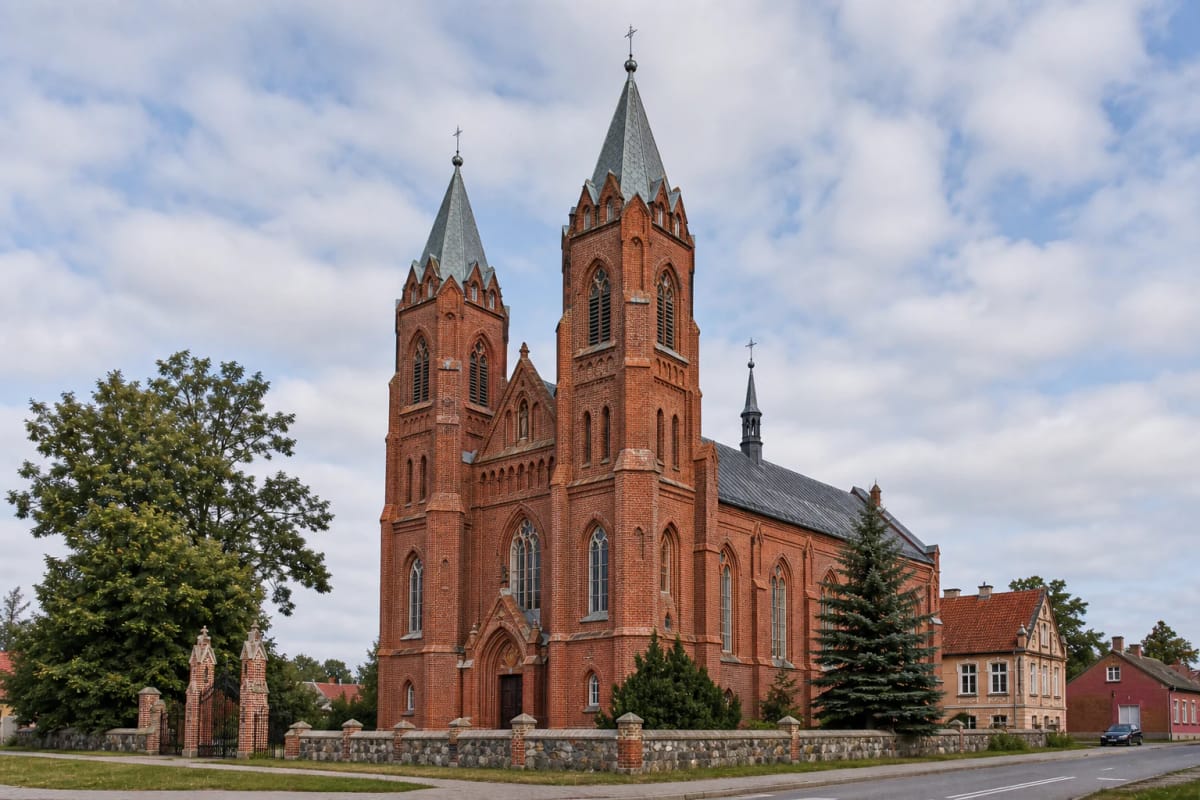 Švėkšna St James the Apostle Neo-Gothic church with two towers in the perspective of the town square