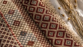 Net pattern in Lithuanian textile and sash ornament