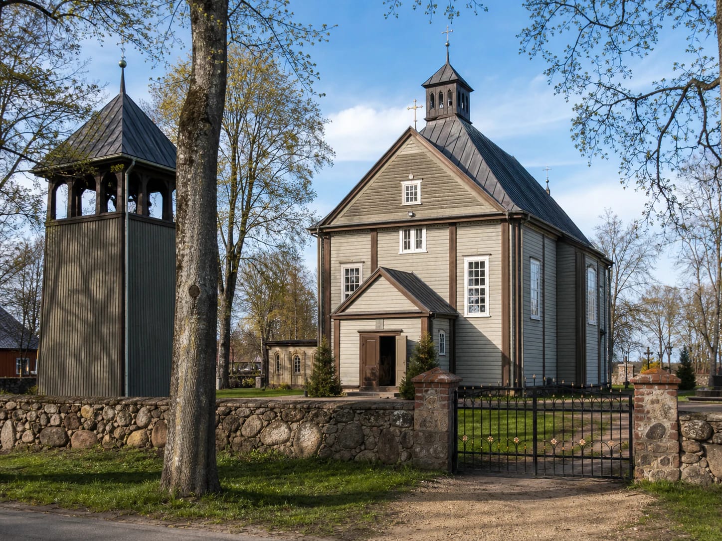 Wooden Church of St Matthew the Apostle and Evangelist in Veiviržėnai with its churchyard