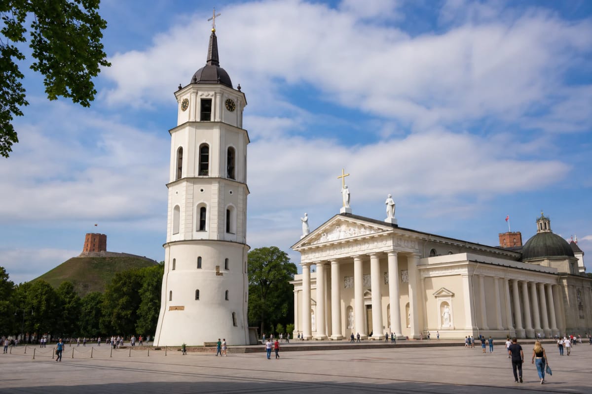 Vilnius Cathedral and separate bell tower in Cathedral Square with Gediminas Hill behind